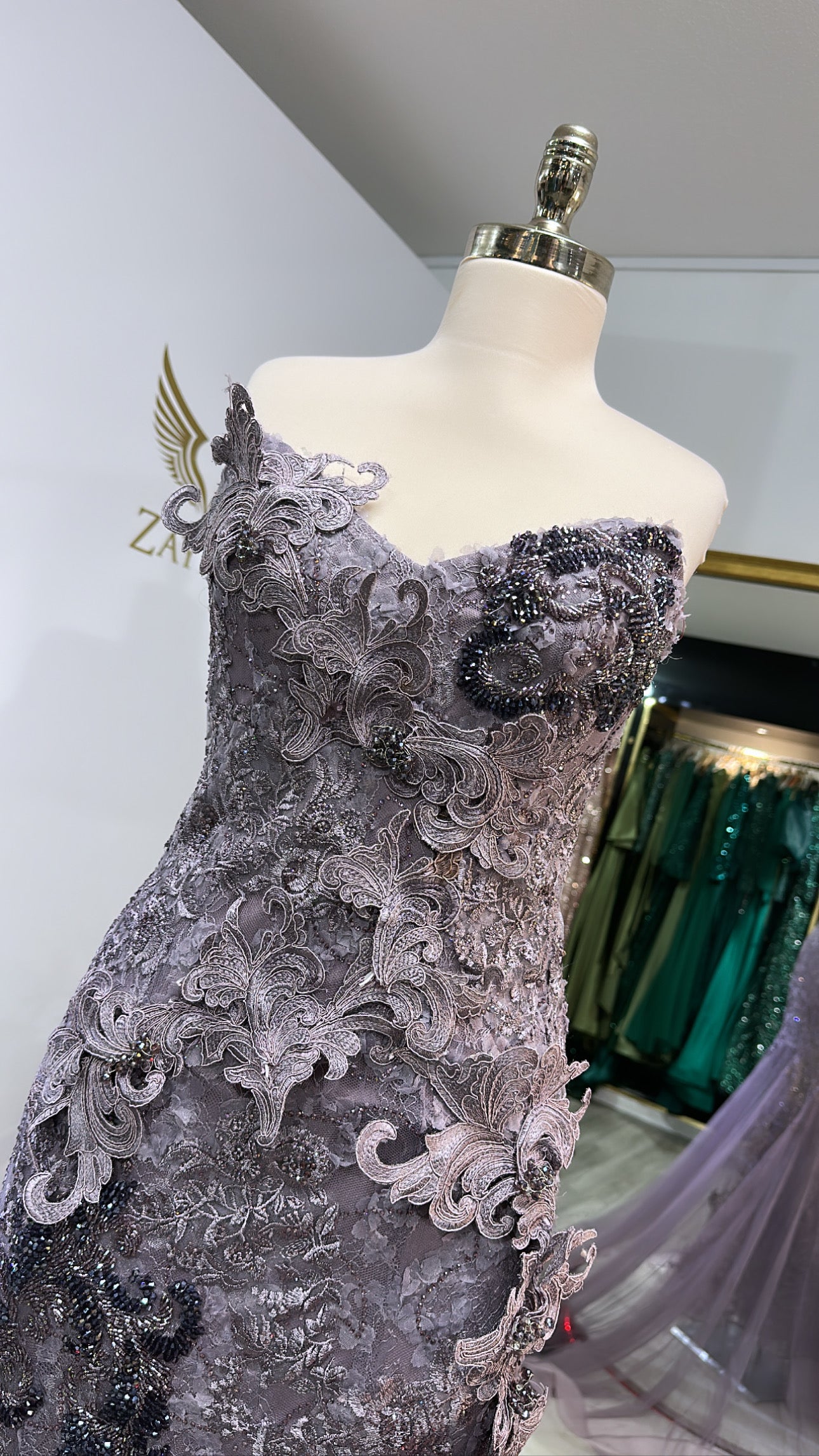 Elegant purple sleeveless dress worked design