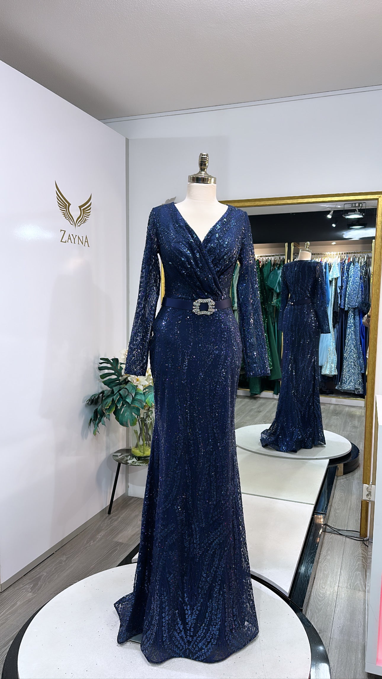Elegant dark blue dress with belt
