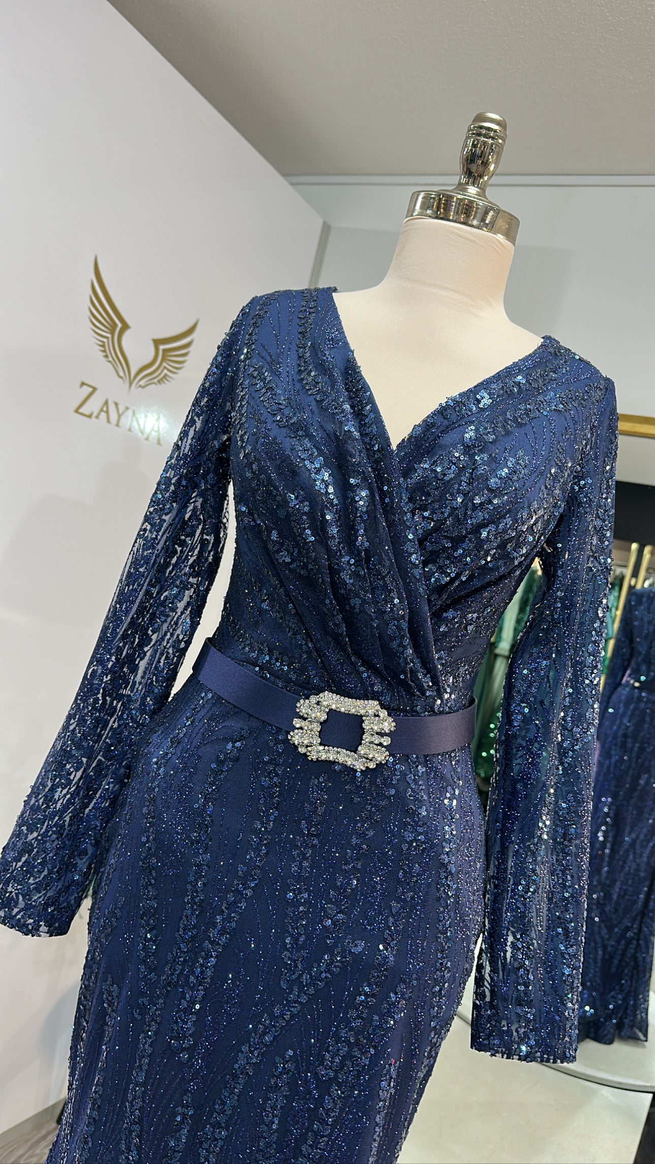Elegant dark blue dress with belt