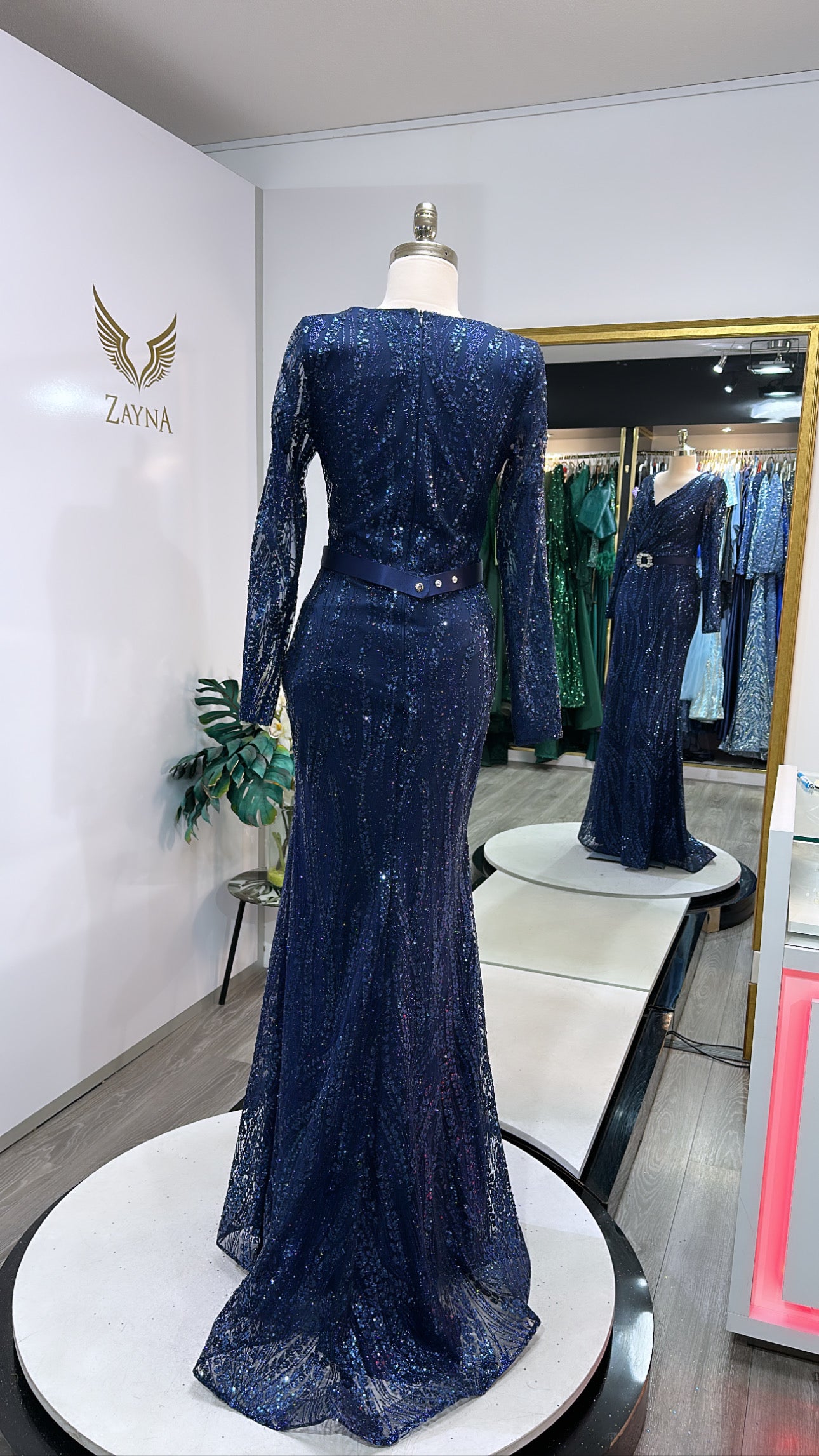 Elegant dark blue dress with belt