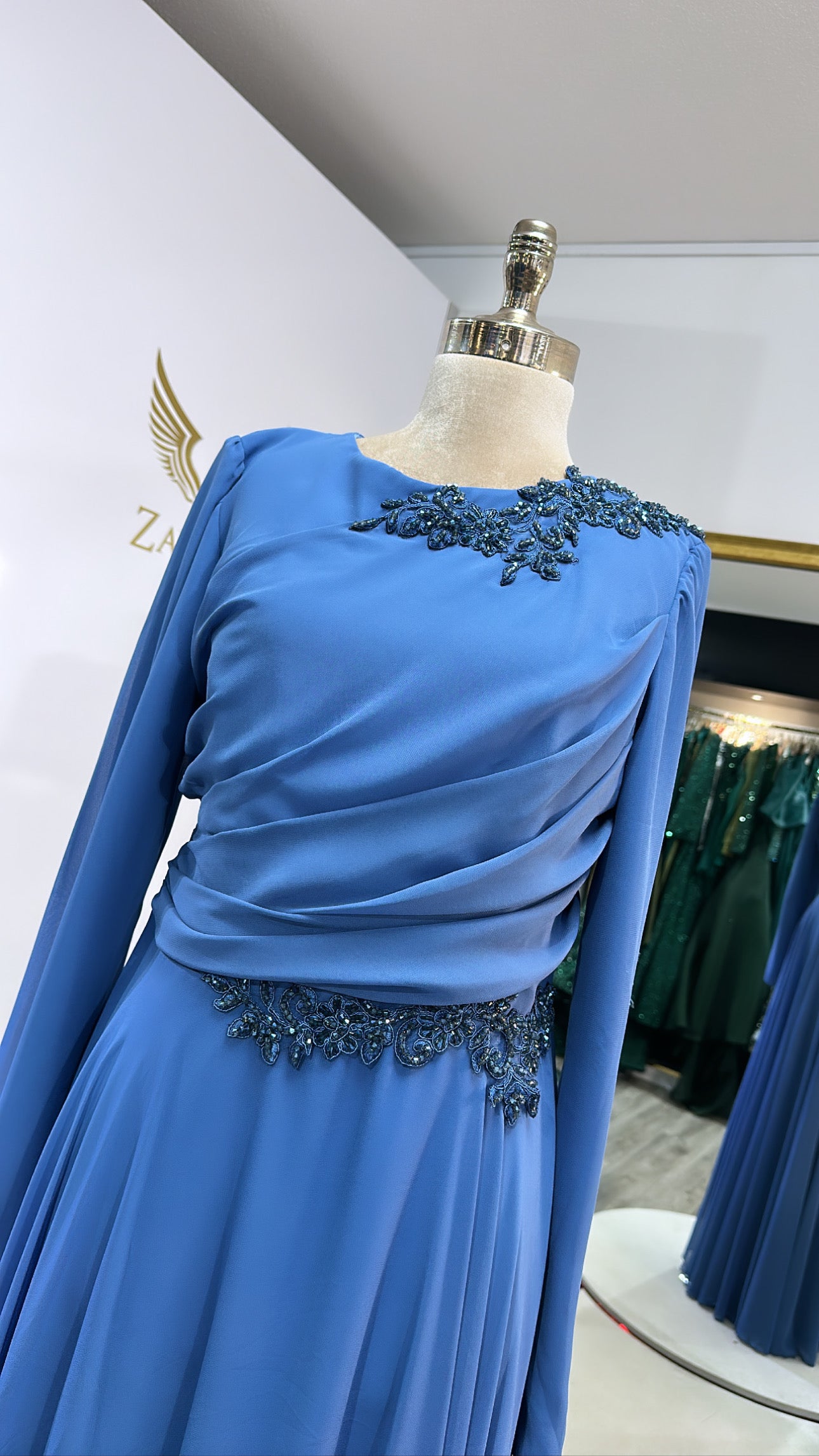 Amazing light blue covered dress, decorated with beads