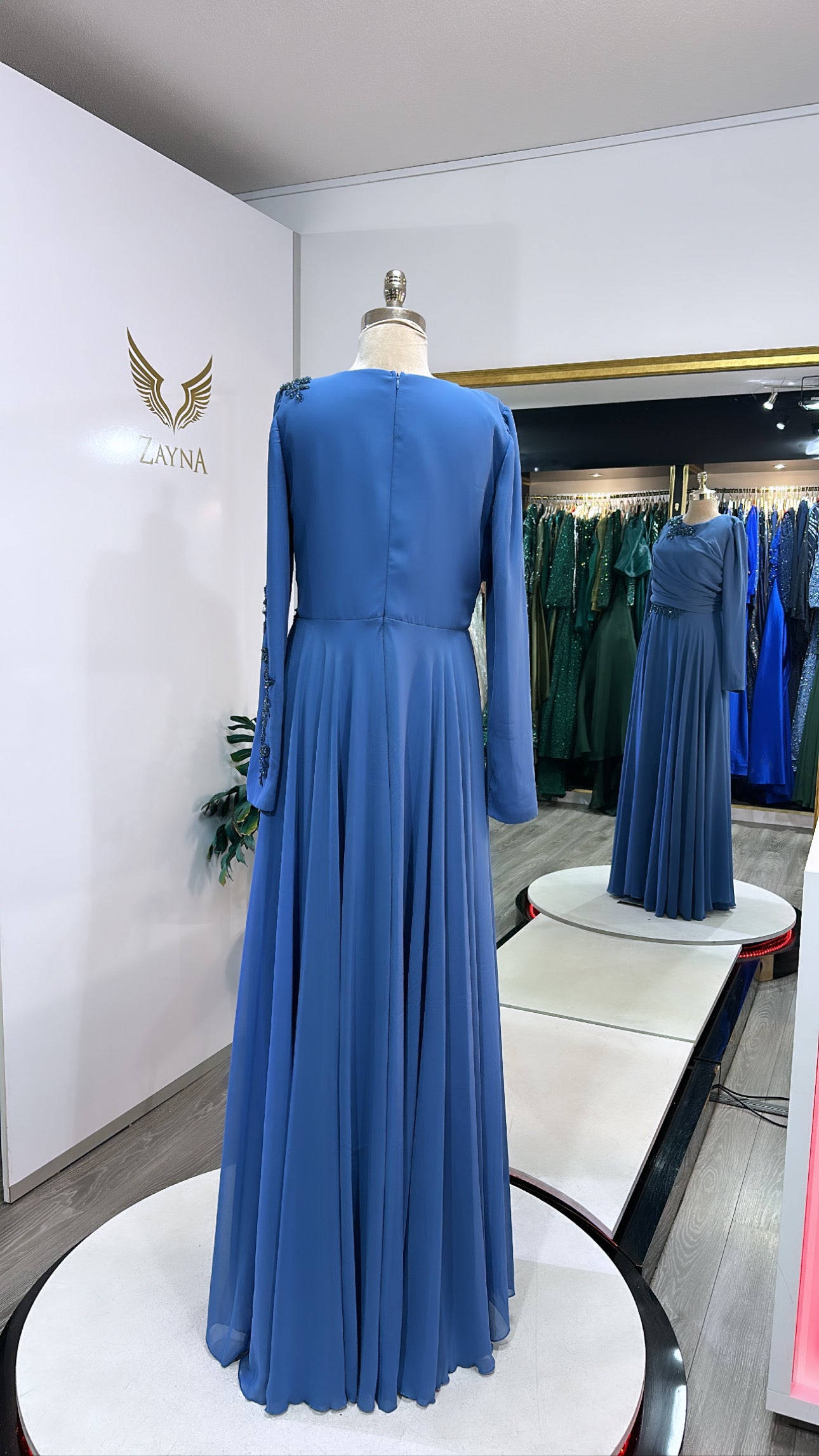 Amazing light blue covered dress, decorated with beads