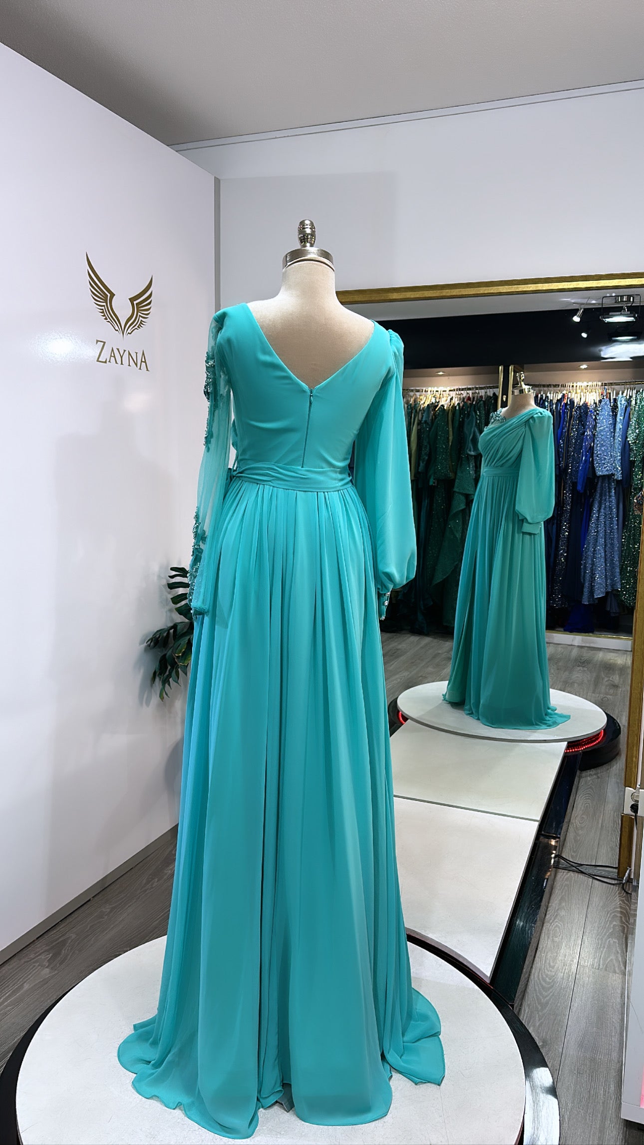 Elegant glass blue dress with one sleeve, split