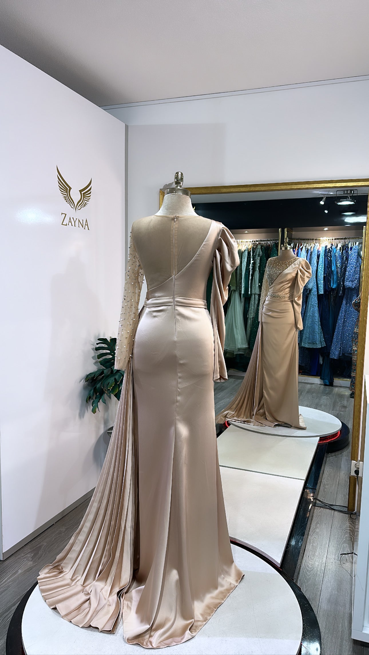 Elegant beige dress design with beads