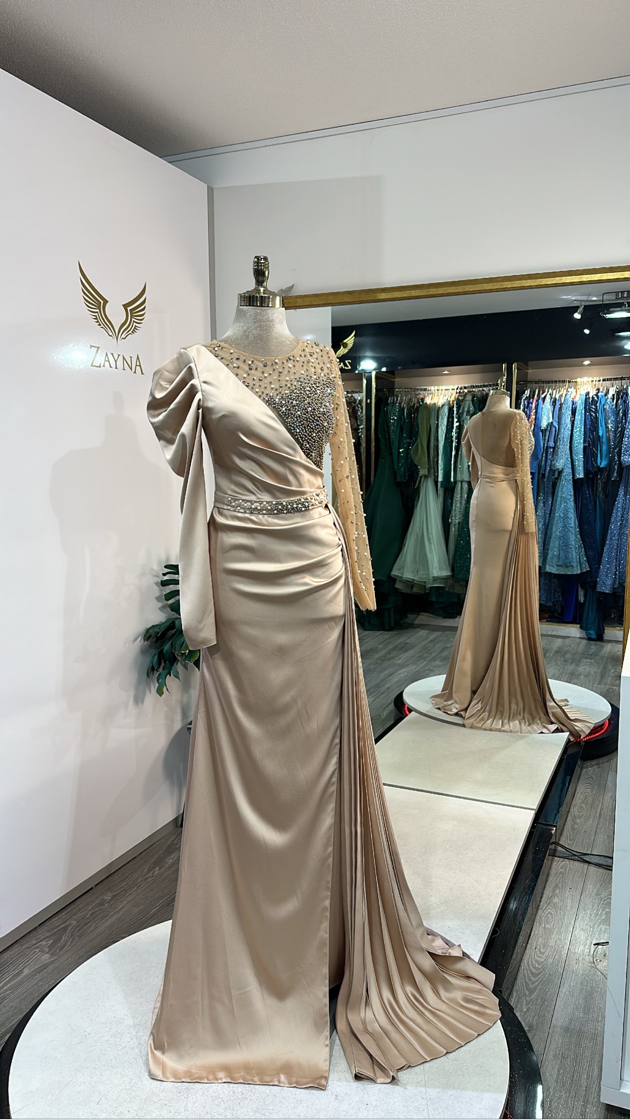 Elegant beige dress design with beads