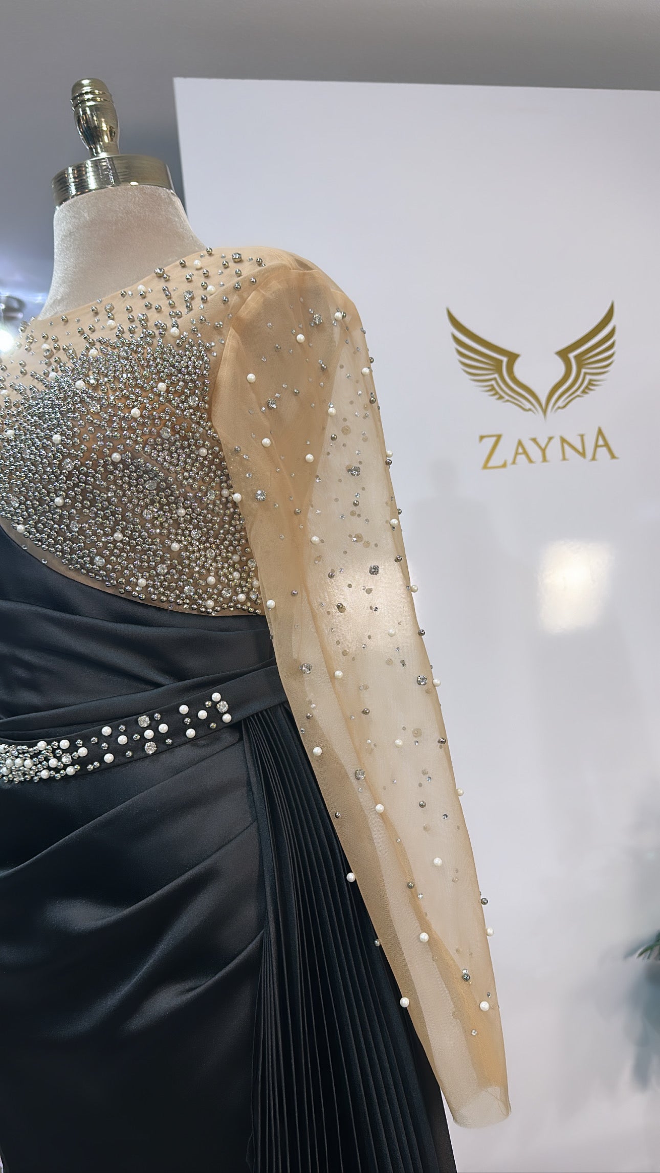 Elegant black dress decorated, satin