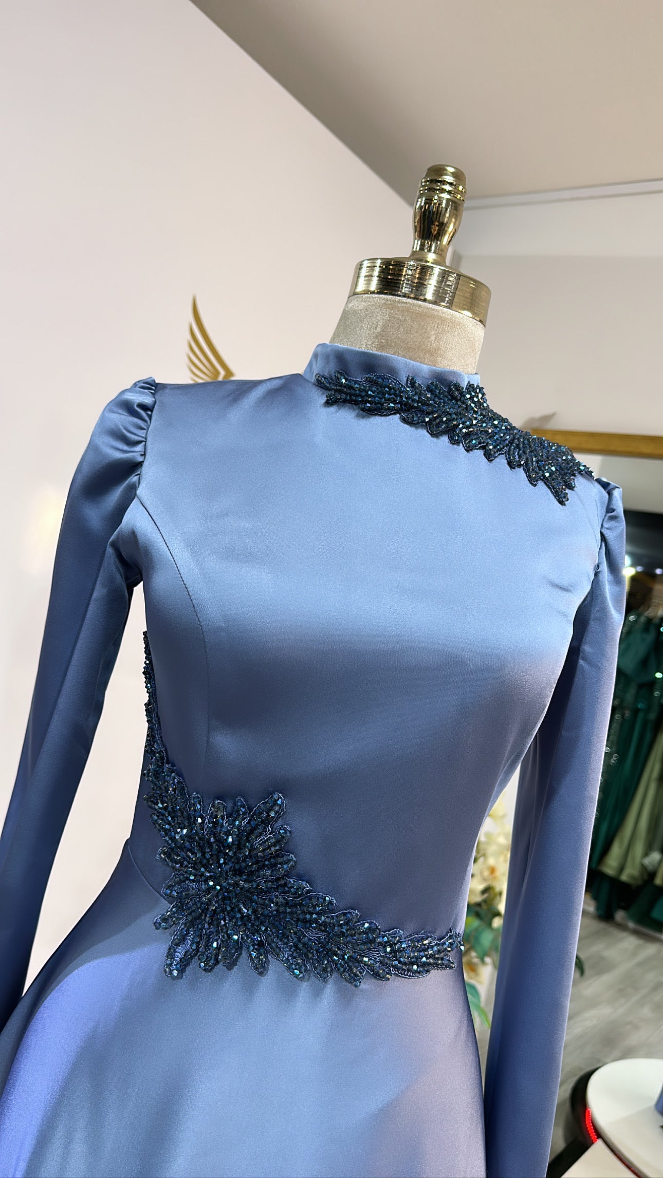 Elegant light blue dress covered, worked, satin