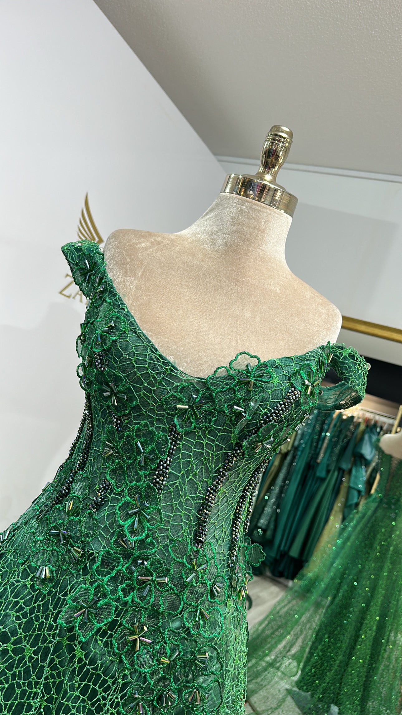 Beautiful green dress details, decorated with beads