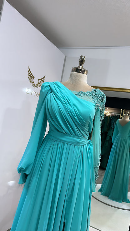 Elegant glass blue dress with one sleeve, split