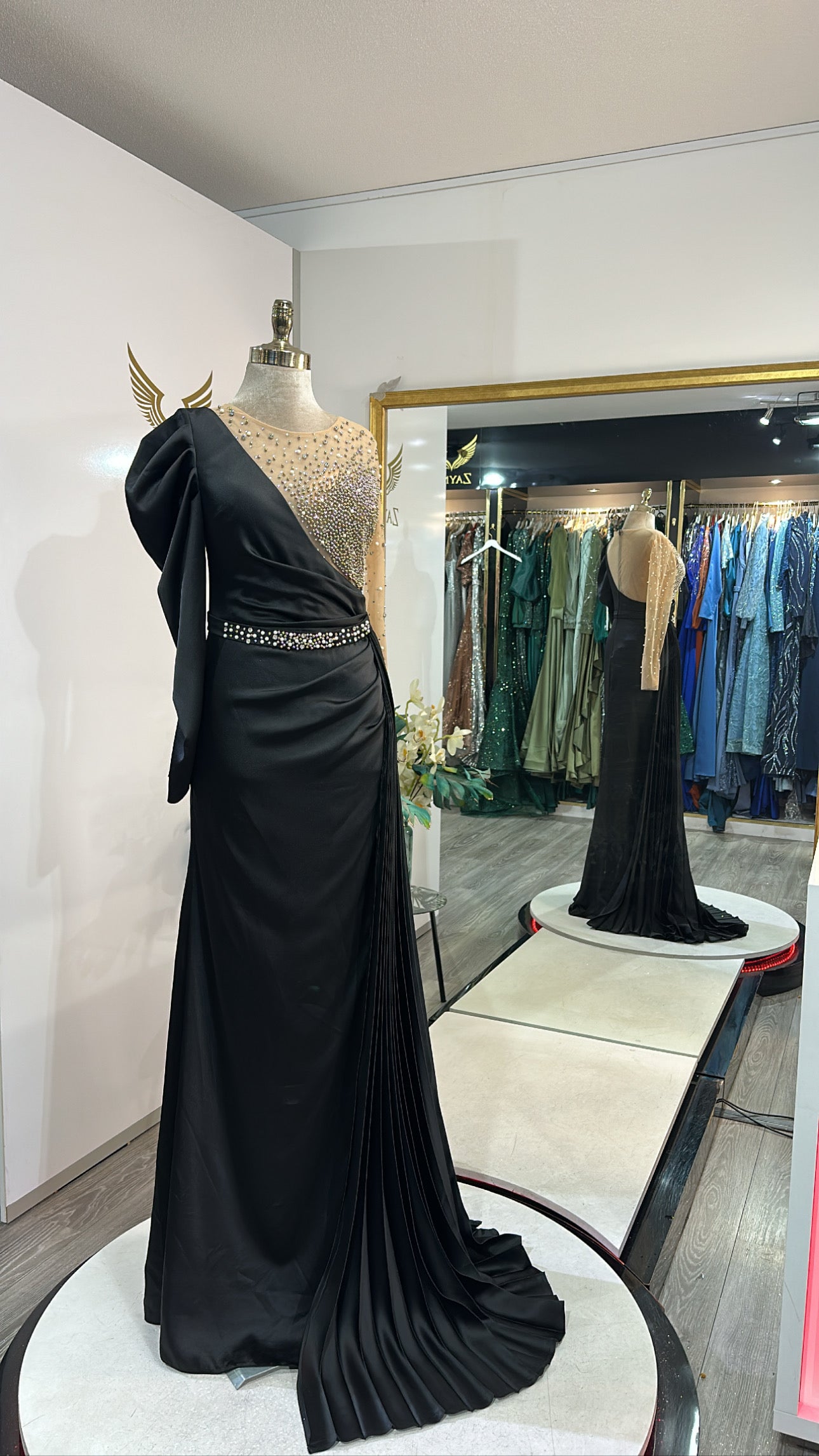 Elegant black dress decorated, satin