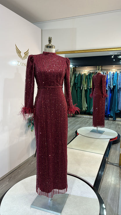 Elegant bordo dress with feathers