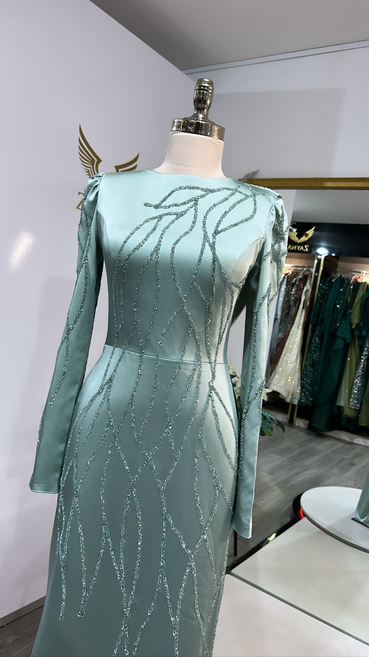 Elegant mint green dress decorated, covered