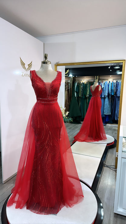 Elegant red dress with train, decorated with beads