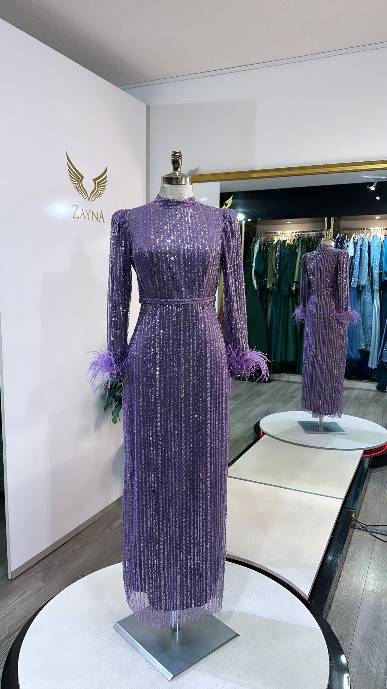 Elegant purple dress with glitter, feathers