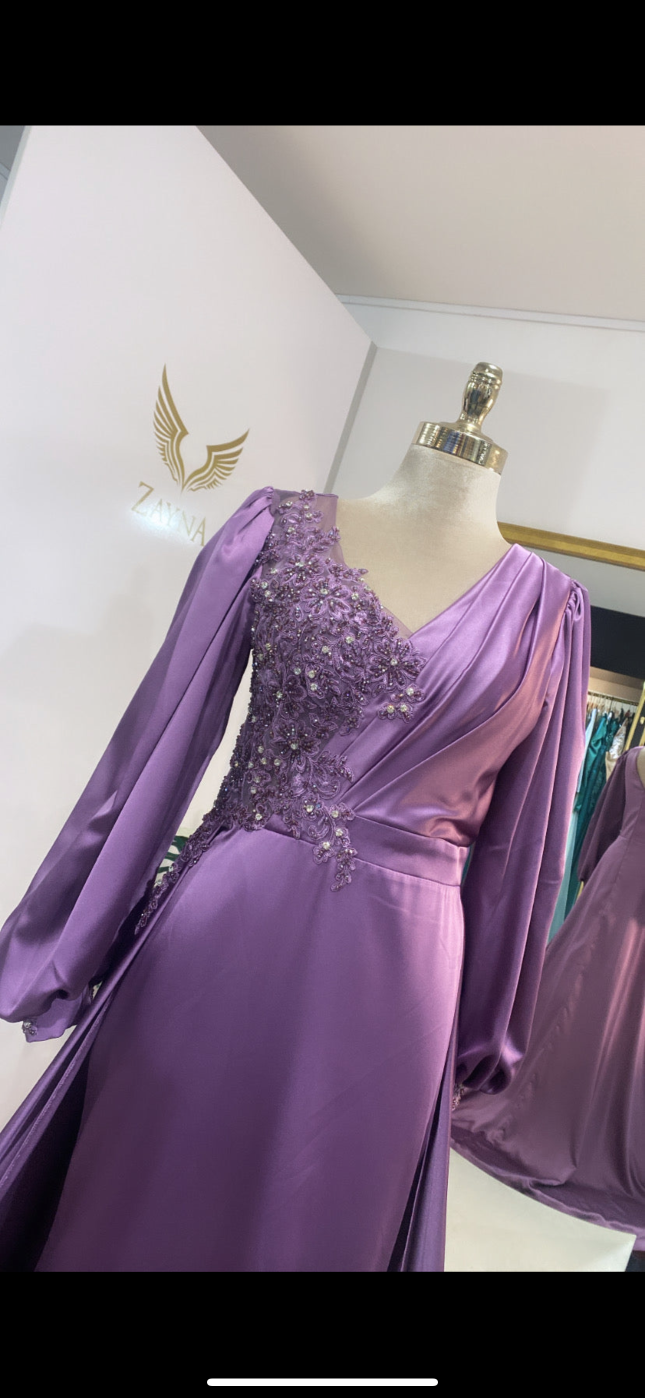 Elegant purple dress with train decorated with beads