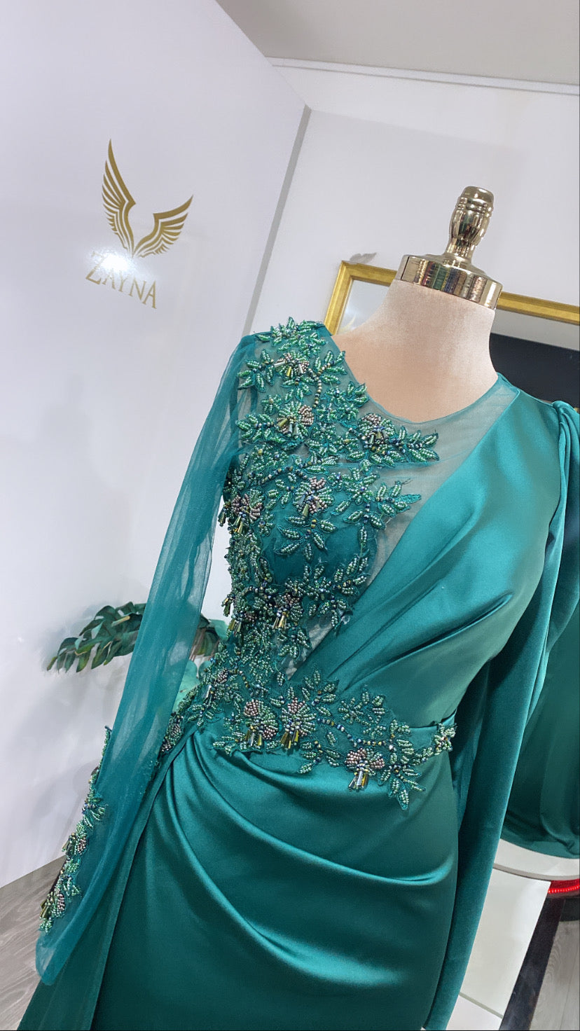 Our hand-embroidered green beaded evening dress