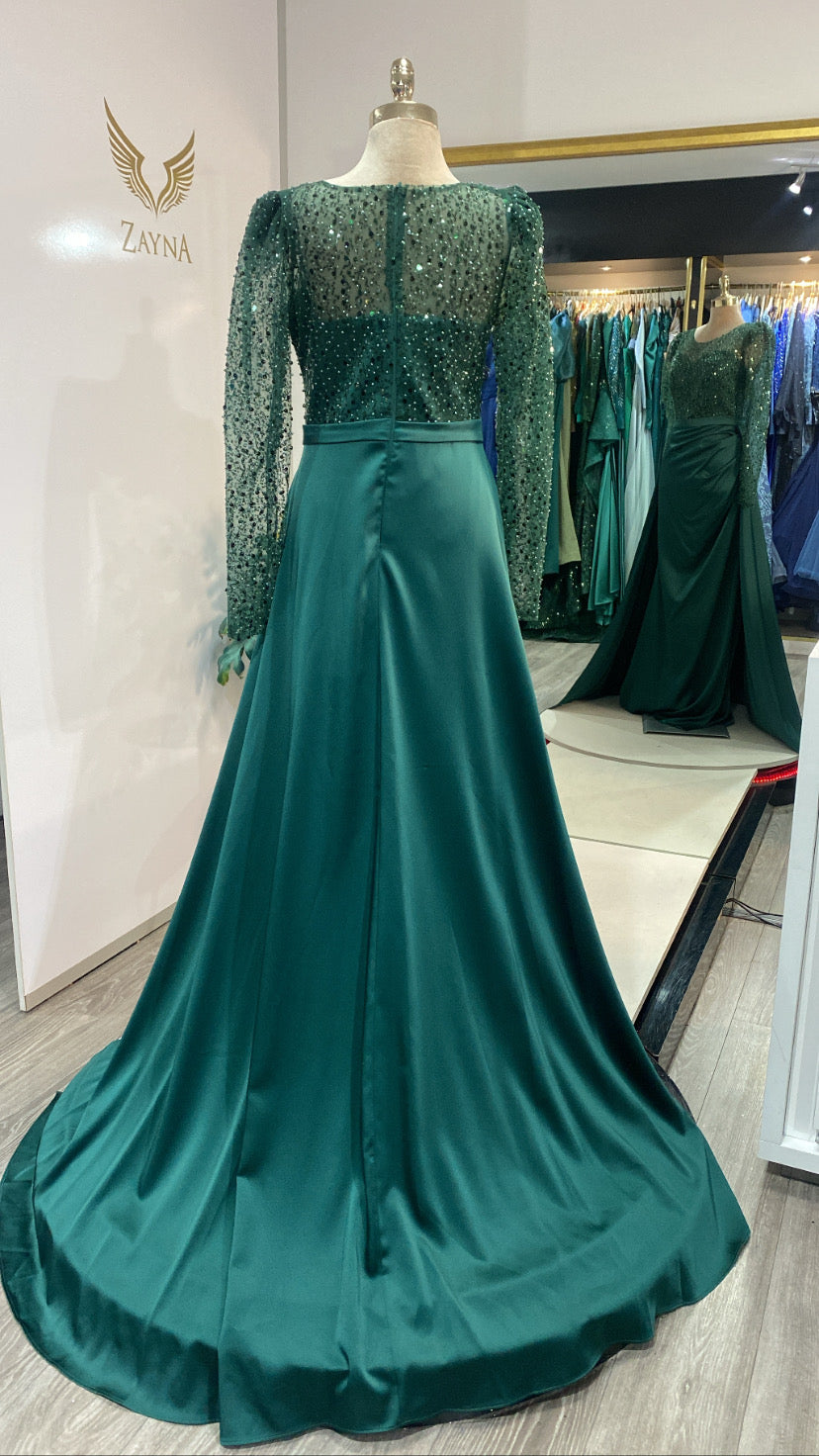 Elegant green dress with trailing beads