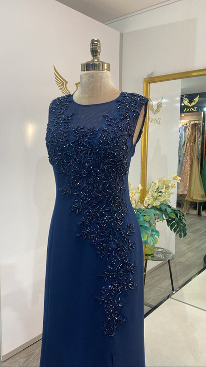 Elegant dark blue dress decorated with beads