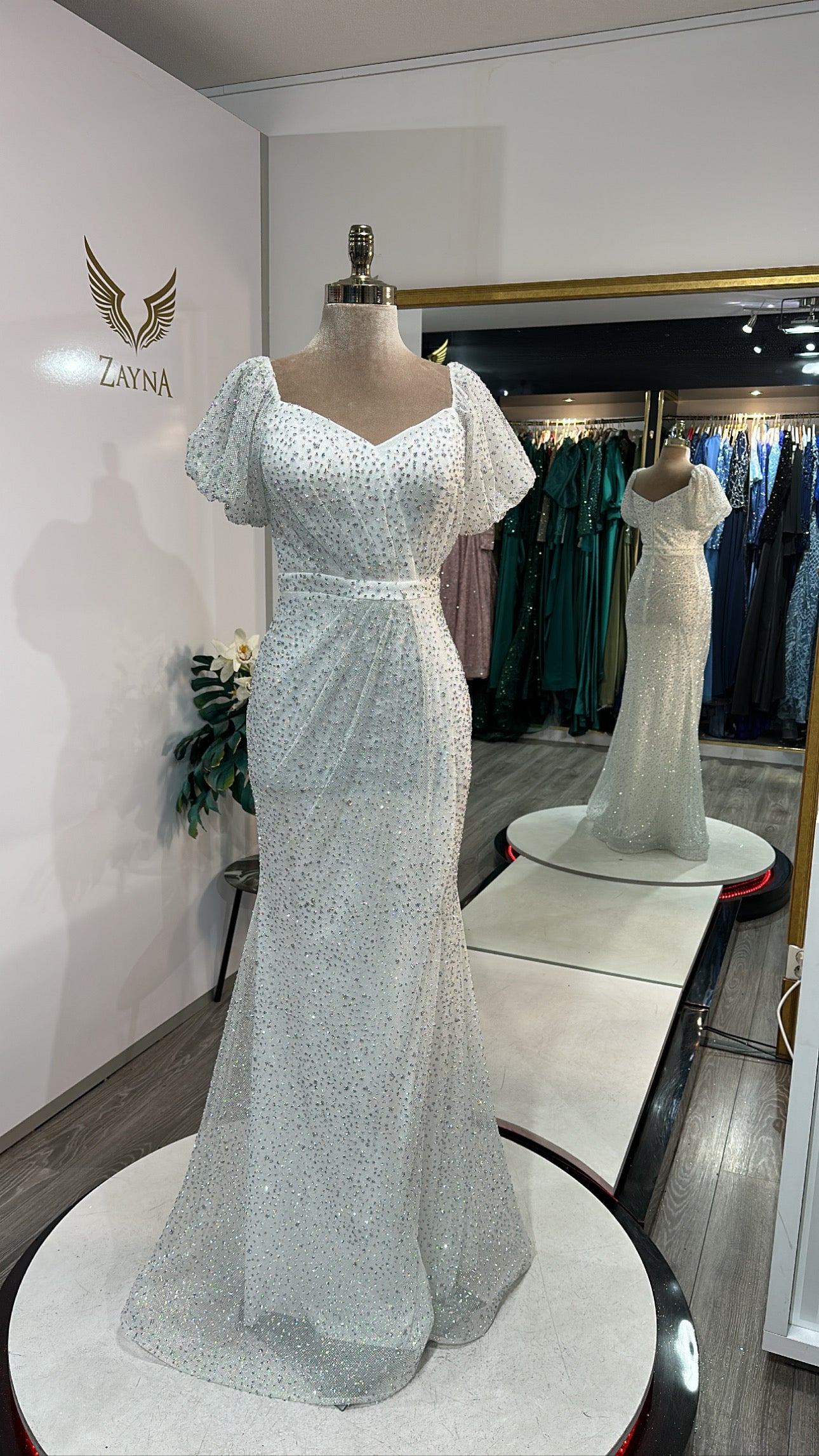 Elegant white dress with glitter, beads