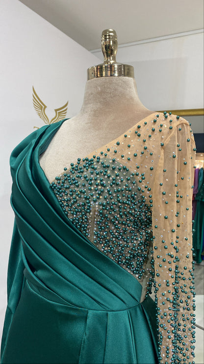 Green dress with detailed shoulder