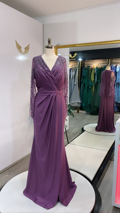 Elegant purple dress decorated with beads