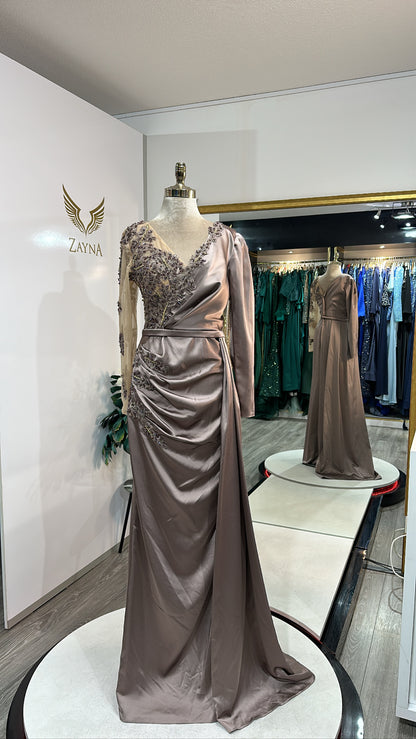 Elegant copper dress decorated with beaded design, satin with split