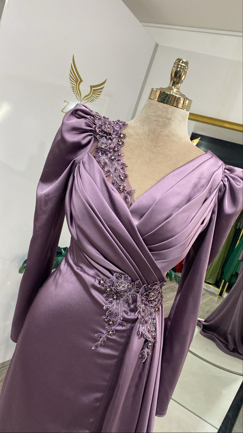 Purple dress detailed with pearls