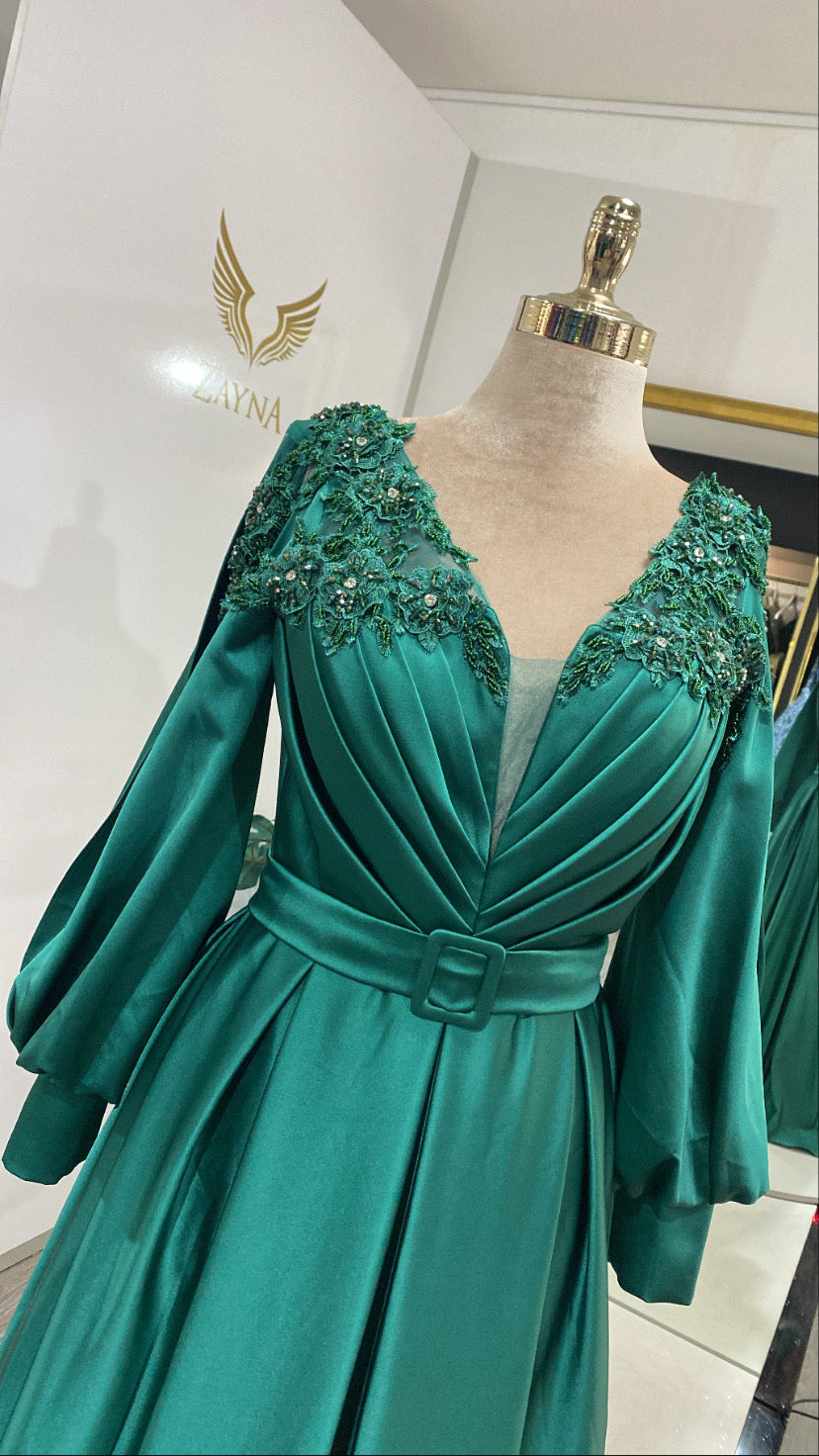 In green color with flowers and beads elegant dress