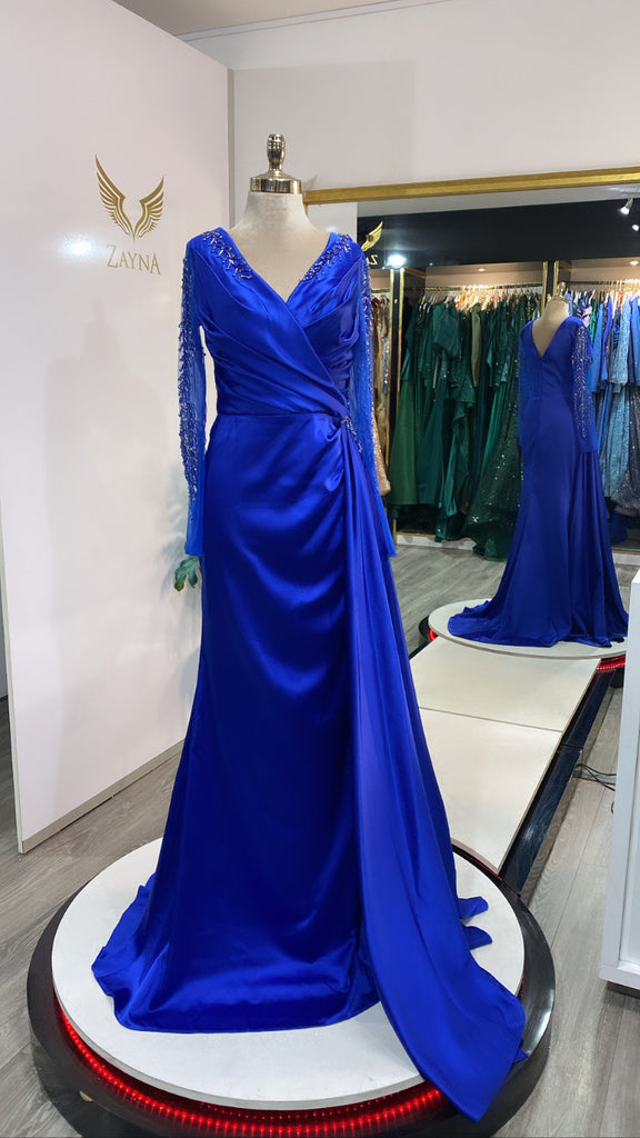 Elegant blue dress decorated with beads