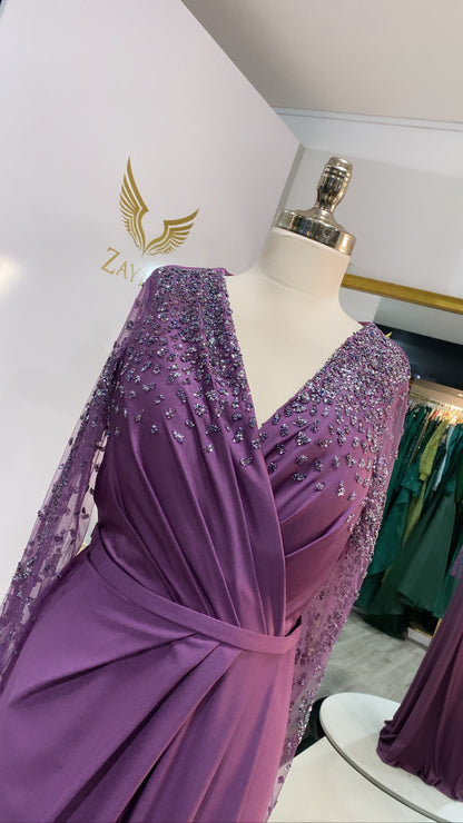 Elegant purple dress decorated with beads