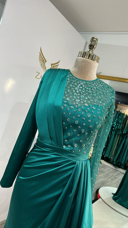 Elegant green dress decorated with beads, satin, design