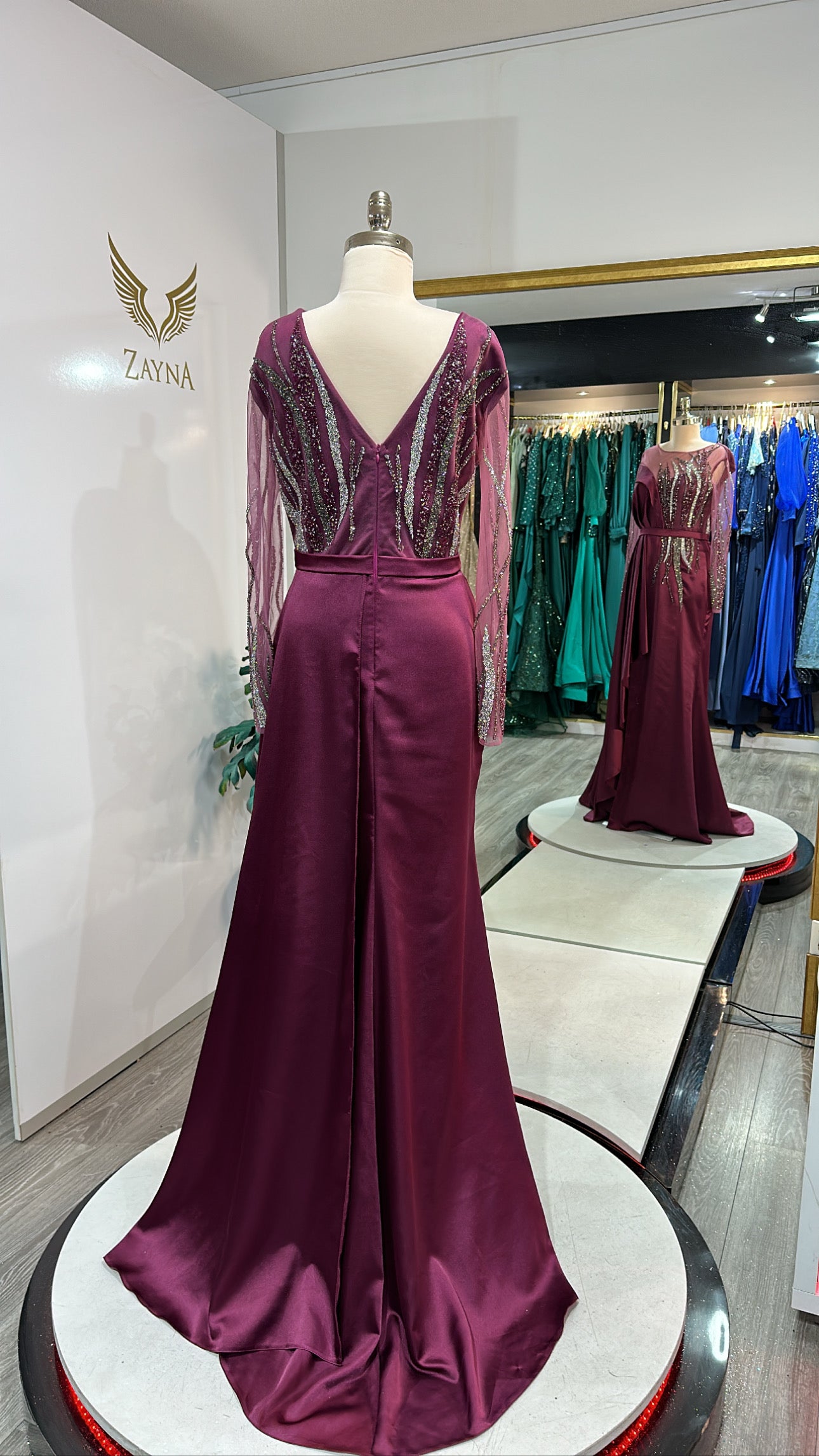 Elegant pink dress decorated with beads, satin