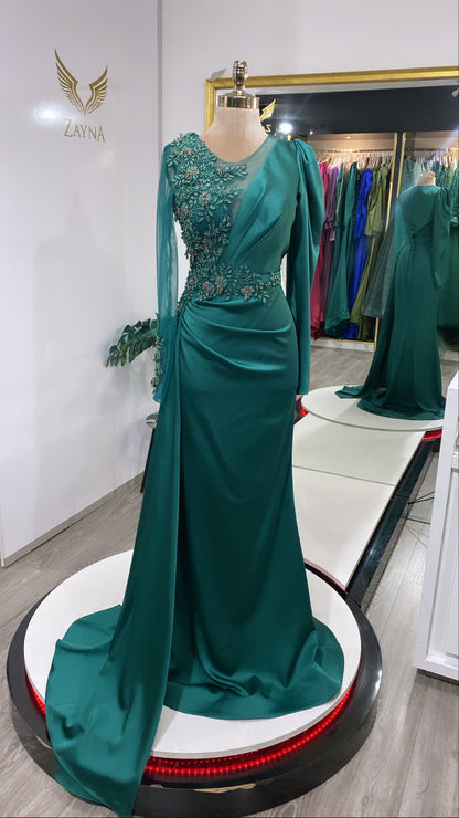 Our hand-embroidered green beaded evening dress