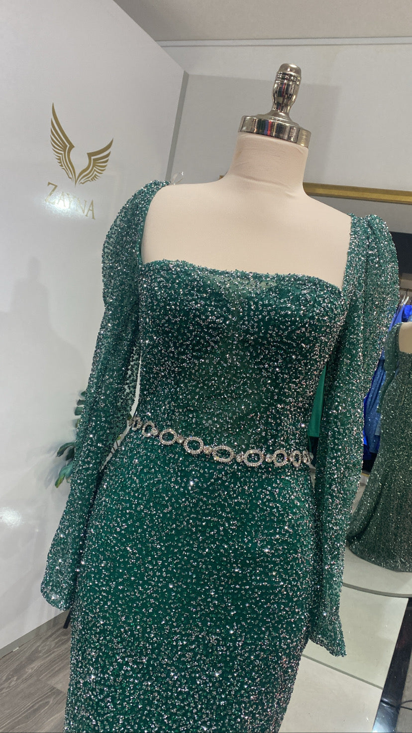 With pearls elegant green dress